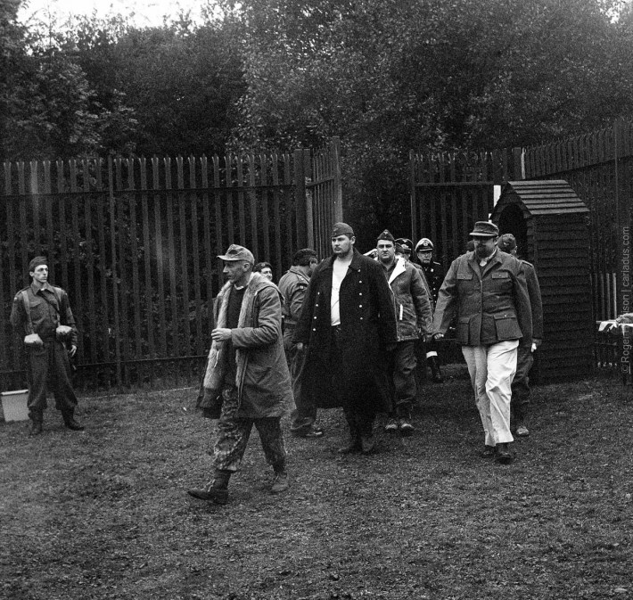 German POW re-enactors entering the compound.
